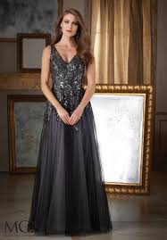 Beading On Embroidered Appliques Onto Tulle Mother Of The Bride Dress Designed By Madeline Gardner Color Evening Dress Fashion Tulle Evening Dress Bride Dress