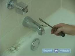 Unless of course your leak is actually flowing then you have a bigger this article is going to cover how to fix a leaky faucet handle whether it's a bathroom faucet or kitchen faucet. How To Fix A Leaky Bathtub Faucet Removing The Spout From A Leaky Bathtub Faucet Youtube Bathtub Faucet Bathroom Faucets Replace Bathtub Faucet