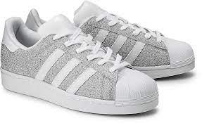 Durch die vielfältige farbpalette, bei der die streifen teilweise im kontrast und teilweise ton in ton umgesetzt wurden, können sie den schuh perfekt zu. Superstars Glitzer Streifen Online