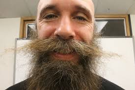 Wild beards can't be broken: Moustachioed man takes 10-inch facial hair to  show