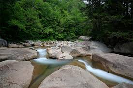 Its state motto is live free or die, it has no sales tax, and it's known as the granite state. Franconia Falls New Hampshire