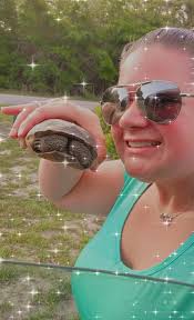 Is this anyone's pet? He was trying to cross saufley feild road, I moved  him away from the road. Should I call animal control? Not sure what to do,  he's appears to