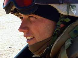 Portrait of US Marine Corps (USMC) Sergeant (SGT) Eric A. Schrumpf,  Headquarters Company (HQ CO) 5th Marines, Camp Pendleton, California (CA),  in the desert of Kuwait. The US Marines along with members