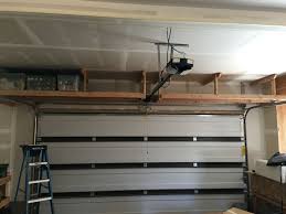 If your garage isn't painted, you can easily identify stud locations by the vertical rows of nails or screws. Diy Overhead Garage Storage Page 5 Line 17qq Com