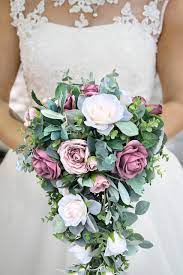 Dark teal and orange boho bouquet, boutonnière, hair comb and corsage, sola and artificial flowers. Cascading Bridal Bouquet In Dusty Rose Mauve With Sage Eucalyptus Cascade Thebridesbouquet Com