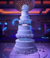 Floating Tiers With Pretty Sugar Flowers Excited For Tonight S Episode Of Ext Wedding Cake Planning Winter Wonderland Wedding Cakes Wonderland Wedding Cake