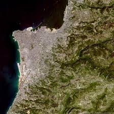 Lebanon has a narrow coastal plain along the mediterranean sea, which is 225 kilometers (139.8 miles) long and is bordered by syria on the north and east and by israel on the south. Beirut Lebanon Image Of The Week Earth Watching