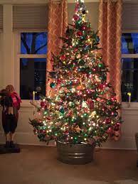 The whole tree glows and the strands of lights aren't barely as noticeable as with the lasso method. Mixed White Lights With Colored Lights This Year And Love The Results Christmas Tree Ideas With Colored Lights Jewel Tone Christmas Tree Cool Christmas Trees