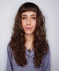 This hairstyle with bangs starts with eyebrow length bangs cut straight across the forehead. 14 Easy Beach Waves Tutorials How To Get Cute Beachy Waves