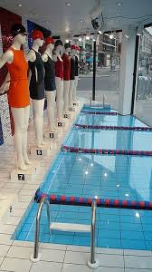 joseph olympic windows swimming pool effect in acrylic window display retail visual merchandising displays window display design