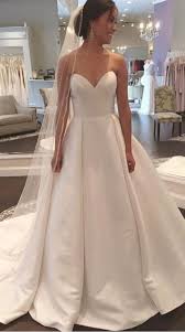 Though simple, this satin wedding dress is a far cry from plain. with lovely traditional elements like a sweetheart neckline and fitted waist, it also offers a few sweet surprises, like side pockets and decorative buttons that trail all the way to the end of the train. Elegant Wedding Dress Leave Out The Soon To Be Husband For The Moment Lets Concentrate On The Bride Whom Vi Simply Exquisite Wedding Gowns Dresses Weddi