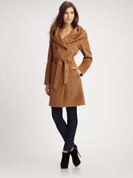 From the classic wool overcoat to the trendy teddy bear, the camel coat is here to stay. Cole Haan Camel Double Breasted Alpaca Wool Coat
