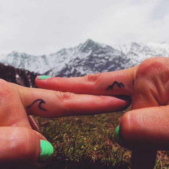 Tiny tattoos on fingers - Tattoogrid.net