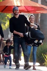 Mila kunis and ashton kutcher kept it casual while visiting a farmers' market in los angeles on sunday (march 7) with their children, son dimitri, 4, and daughter wyatt, 6. Ashton Kutcher Mila Kunis Get With Their Children Out In Los Angeles 06 Gotceleb