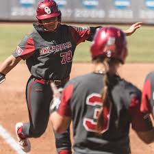 Oklahoma fans stand as players gesture to them during the fifth inning of an ncaa women's college world series softball game against ucla, saturday, june 5, 2021, in oklahoma city. Oklahoma Coach Wants To See Sooners Bow Up Sports Illustrated Oklahoma Sooners News Analysis And More