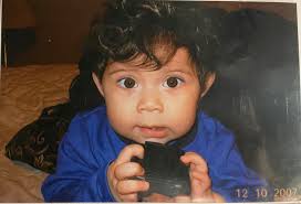 This is our new baby Patina or Tina or Piña she is very opinionated and  talks constantly. Here's her not letting me have personal space. She is  less than 10% white I