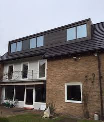 Grosse Flachdachgaube Mit Einer Fassade Aus Vorbewittertem Kupferblech Dachgauben Anbau Haus Gaube