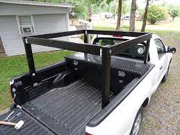 Unfortunately, the tacoma's wheel wells cramp the bed space and don't allow for full sheets of plywood to fit inside. Diy Wood Bed Rack For Hauling Kayak Canoe Surfboards Tacoma World