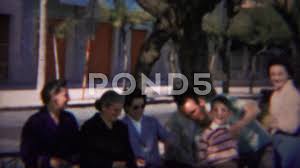 1964: Dad publically spanking boy with l... | Stock Video | Pond5