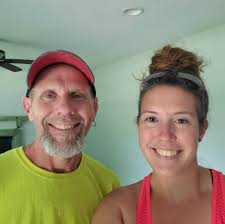 Who can refinish kitchen cabinets with spray paint in Auburn, Indiana?