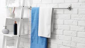 On the opposite side of the vanity, a unique hexagon shelving unit provides consider towel holder ideas as part of your bathroom's decor. 11 Towel Rack Ideas For Your Bathroom Robe Mart