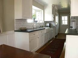 Galley Kitchen With White Cabinets Backslpash Black Counter Katie Kitchen Backsplash Photos White Subway Tiles Kitchen Backsplash White Subway Tile Kitchen