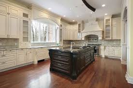 In a white kitchen, you'll generally want to go with a darker color for the island. Kitchen Ideas With White Cabinets Dark Island Brainly