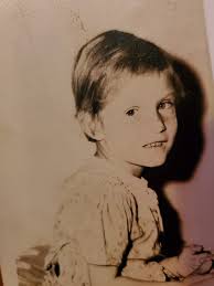 My wonderful mum and Dad ,and me as a little girl with mum and ??