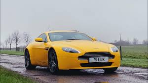 Image result for Sunburst Yellow 2017 Aston Martin