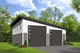 This Spacious Garage Plan Comes With A Tandem Bay For Two Automobiles And A Large Rv Bay The Slanted Roof Lin Rv Garage Plans Garage Plan Garage Workshop Plans