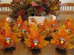 Combining black and white checkered table settings with orange creates a fun welcome vibe. Thanksgiving Table Ideas That Are Fun For The Whole Family