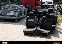 Long rows of Japanese cushion car seats on the forecourt of ...