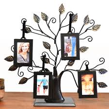 Check out our family picture frame selection for the very best in unique or custom, handmade pieces from our wall hangings shops. Thetford Design Family Tree Photo Frame With 4 Hanging Picture Frames Medium Size Buy Online In Angola At Angola Desertcart Com Productid 52810387