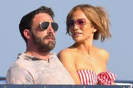 Jennifer Lopez Is Yacht-Chic in a Striped Bandeau, Flowing Pants & Cherry  Red Wedges With Ben Affleck