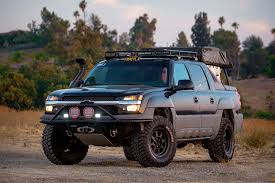 Very tall lift kit with all aftermarket suspension. An Overland Chevy Avalanche Expedition Portal