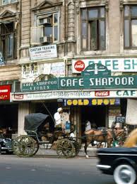 View of Bombay Street with Taxis and a ...