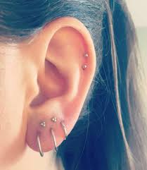 The removal can sometimes be difficult, but there are ways to make the process easier. Ball Trinity Shop This Instagram From Maria Tash Earings Piercings Cute Ear Piercings Different Ear Piercings