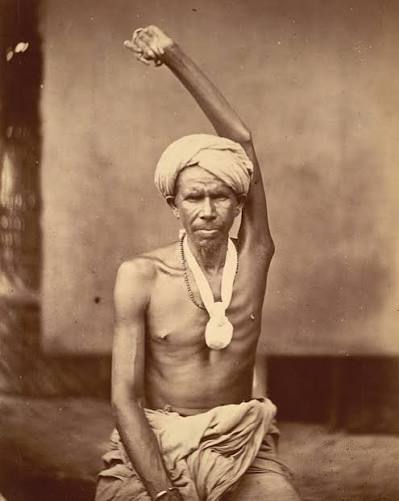 Early 1860s. A sanyasi or wandering Hindu mendicant who has vowed to never take his hand down. Sanyasis or sadhus are holy men who have taken the path of renunciation. In the
