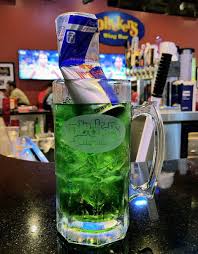 Pour the blue curaçao in the long drink glass. What Is An Irish Trash Can