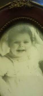 The only photo i have of me as a baby 👶 Anyone help brighten this up ...  Thanks in advance x