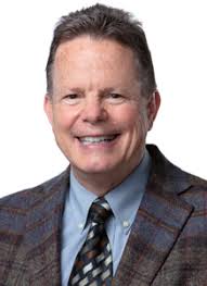 William E. Stricker, MD