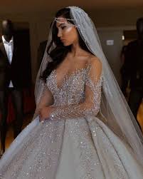 Luxurious Sparkly 2019 African Wedding Dresses Sheer Neck Long Sleeves Bridal Dresses Bead Wedding Dress Long Sleeve Ball Gowns Wedding Ball Gown Wedding Dress