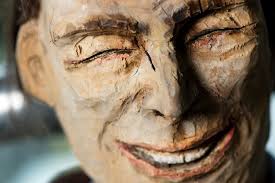 Meet the family: Jim Broadbent unveils his quirky wooden statues