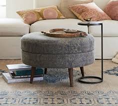 Jade Upholstered Round Ottoman In 2020 Round Storage Ottoman Storage Ottoman Coffee Table Round Ottoman
