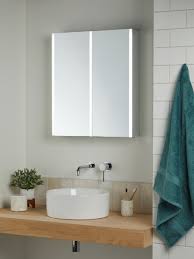 The clever use of bathroom cabinets will not only add a calm ambiance but help maintain a neat, discreet finish. John Lewis Partners Vertical Double Mirrored And Illuminated Bathroom Cabinet At John Lewis Partners