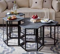 Besides, it is sometimes also important to consider top material. Pairing A Geometric Base With A Graphite Marble Top The Alegra Hexagon Bunching Coffee Table Bring Coffee Table Hexagon Coffee Table Coffee Table Pottery Barn