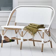 Set one at the foot of your bed or in front of a window. 2 Seater White Paris Pe Rattan Outdoor Cafe Bench Temple Webster