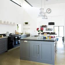 The island is a stained maple and cabinets on the perimeter are painted in light grey with charcoal grey tones. Modern Country Kitchen Country Kitchen Kitchen Ideas Ideal Home Modern Country Kitchens Country Kitchen Home Kitchens