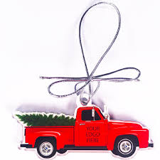 Festive red vintage truck laden with christmas gifts and pine tree for decorating driving through a winter snow storm in a greeting card design with copy space. Acrylic Vintage Red Truck With Christmas Tree Ornament Perfect Imprints