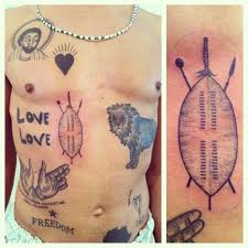 Find out the meaning of muay thai tattoo symbols. Zulu Shield Tattoos Done By Erik En Kim At Shield Tattoo Tattoos Small Tats